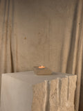PORTLAND LIMESTONE TRITON CANDLE HOLDER